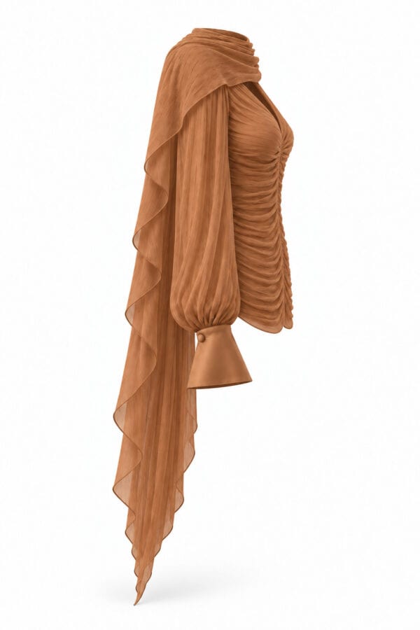Side view of the tobacco Audrey blouse, showing the ruched bodice, satin cuff and draped chiffon cape.